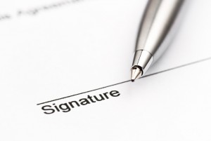 Signature, Ballpoint pen on contract.